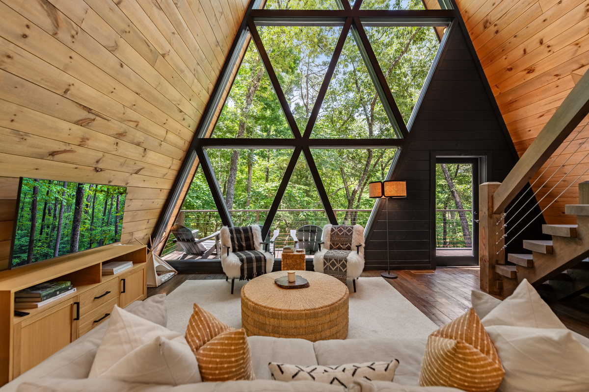 The great room at Big Luxe with floor-to-ceiling glass